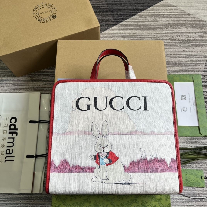 G*u*i shopping bags
